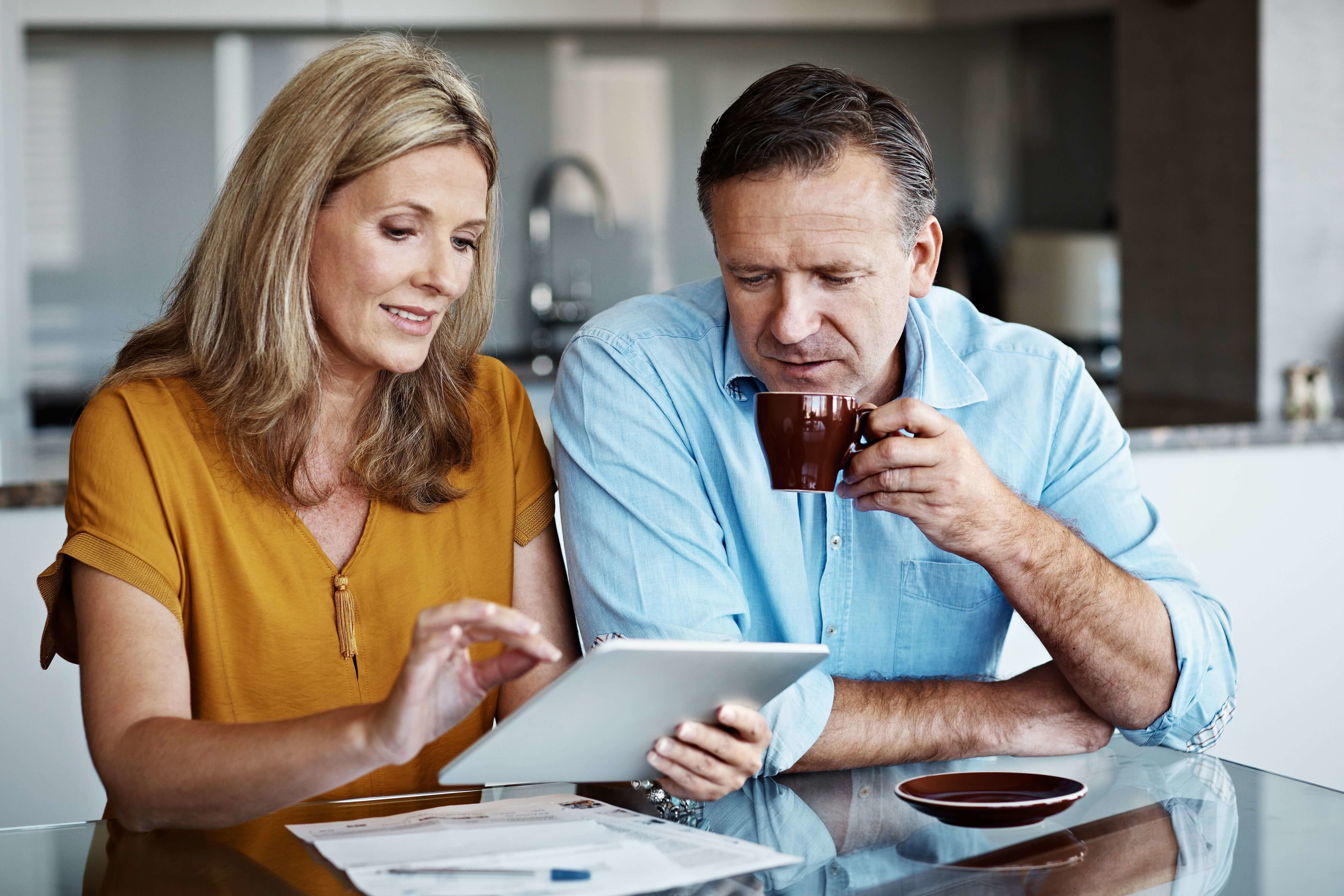 Older couple reviewing financial statements