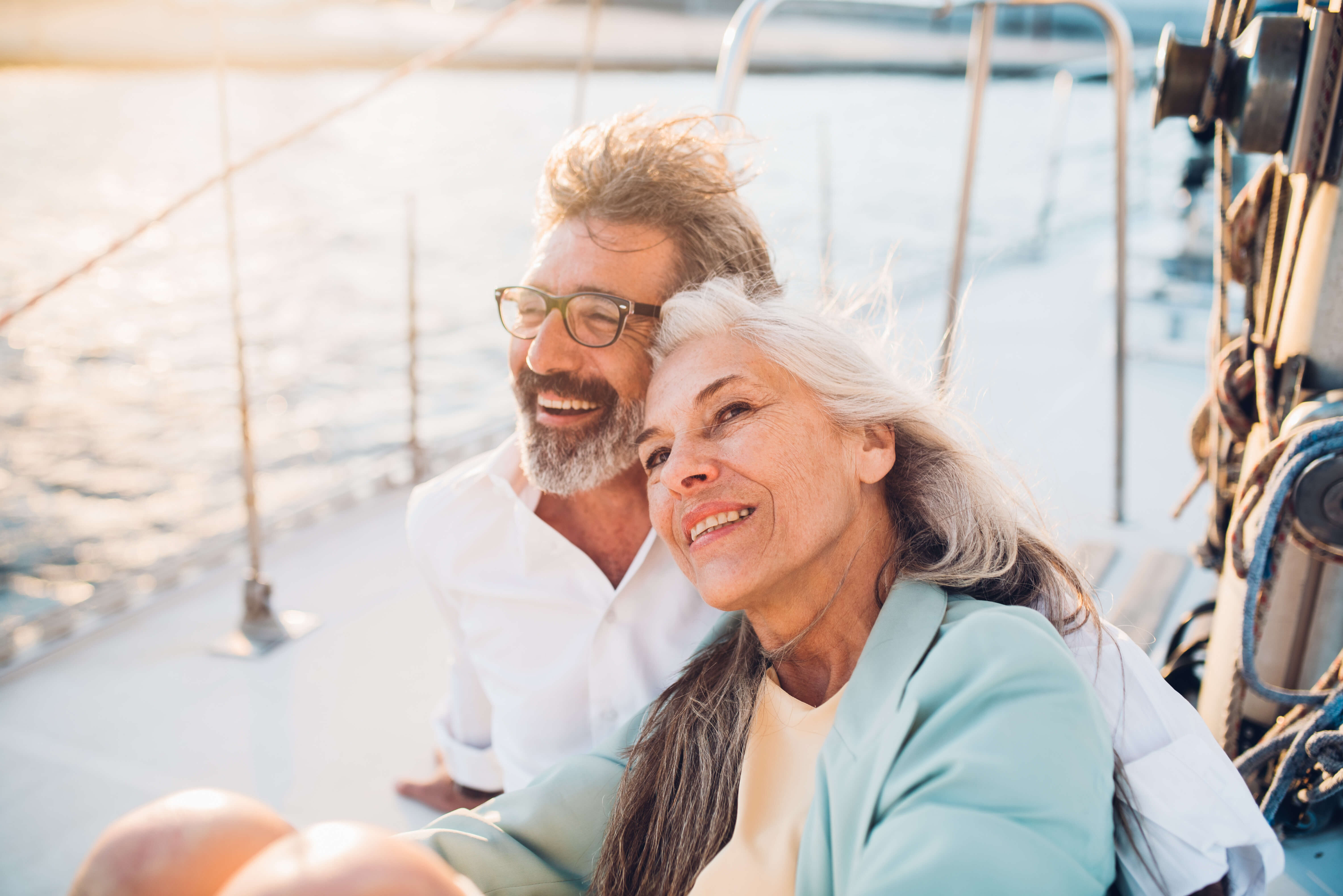 Older couple sitting on boat